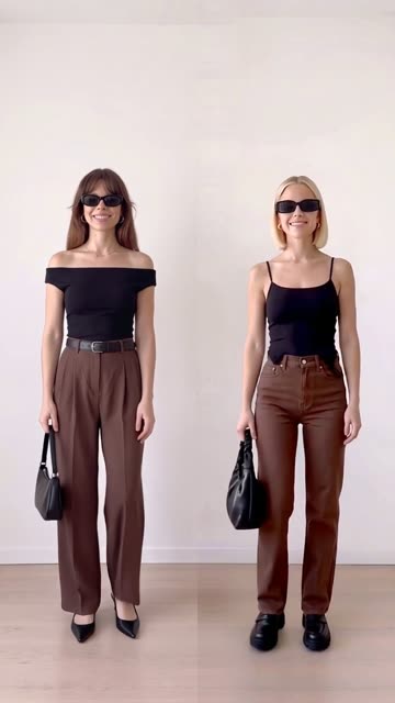 Nora in a black cami worn off the shoulder and Mia in a black cami cropped, both in brown trousers